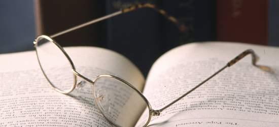picture of glasses on a book
